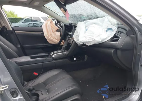 2019 Honda Civic Touring z USA, uszkodzony, nr VIN 19XFC1F91KE202367